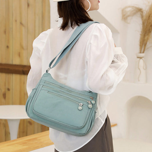 ✨ 50 % RABATT NU! ✨ Lätt nylon crossbody-väska med flera fickor – smidig, säker & perfekt för vardag & resa 🎒