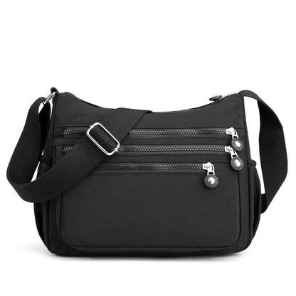 ✨ 50 % RABATT NU! ✨ Lätt nylon crossbody-väska med flera fickor – smidig, säker & perfekt för vardag & resa 🎒
