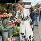 👗 50 % RABATT NU! 🌸 Maxiklänning med blommönster, V-ringning & volangärmar – smickrande siluett, luftig & redo för fest 🥂