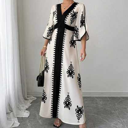 👗 50 % RABATT! 🌸 Elegant V-ringad maxiklänning – smickrande passform, luftig & mönstrad, perfekt för bröllop, middag & strand 🌿